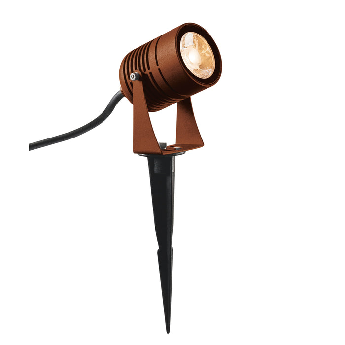 Metal spotlight with a rust finish and black ground stake.