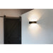 Black metal wall sconce lighting fixture.