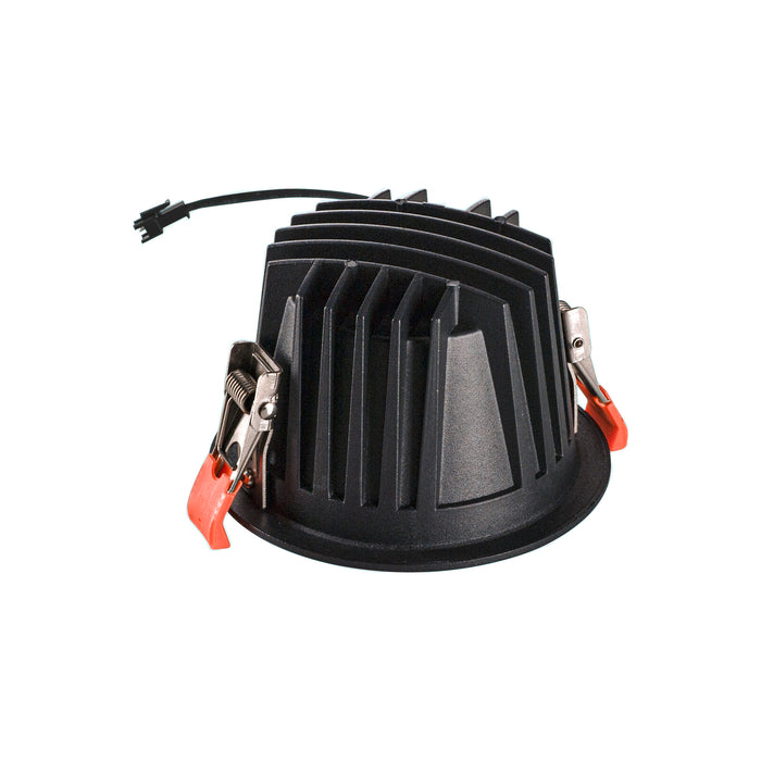 Black recessed LED downlight with heat sink, spring clips for mounting.
