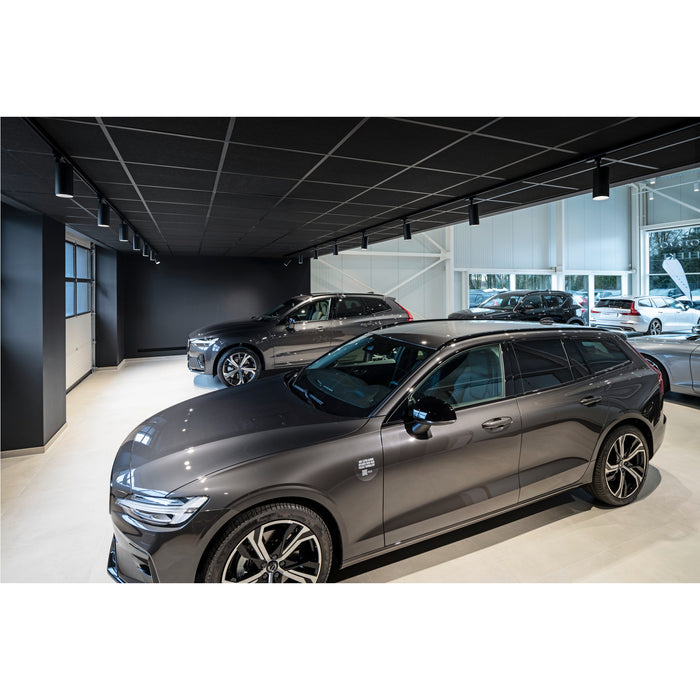 Gray Volvo V60 wagon car in a showroom.