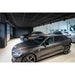 Gray Volvo V60 wagon car in a showroom.