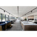 Hot tub showroom featuring various models with wood-look and solid color cabinets.