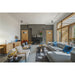 Modern living room with gray fabric sectional sofa, wood cabinet, black fireplace, and marble tile floor.