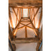Exposed wood beam ceiling with skylight, natural finish, and metal support brackets.