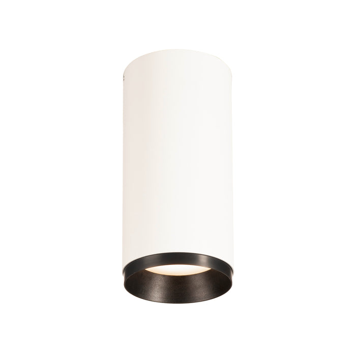 White cylinder surface-mounted light fixture with black interior.
