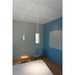 Minimalist white cylinder pendant lights, ceiling mounted.