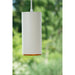 White metal cylinder pendant light fixture, suspended.