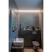 Modern powder room with gray tile walls, white ceramic sink on wood vanity, and wall-mounted toilet.