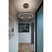Modern black metal LED chandelier with three rings, ceiling mounted.