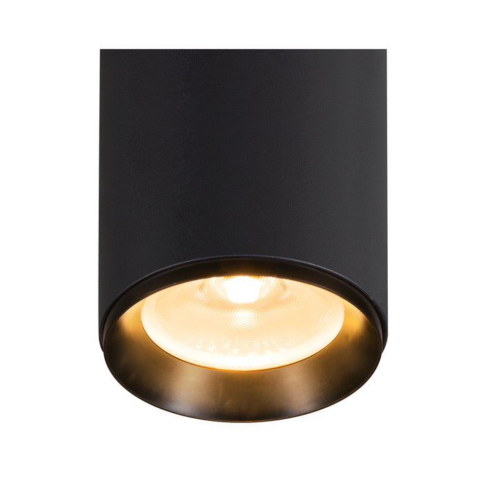 Black cylinder surface-mounted light fixture, metal with textured finish.