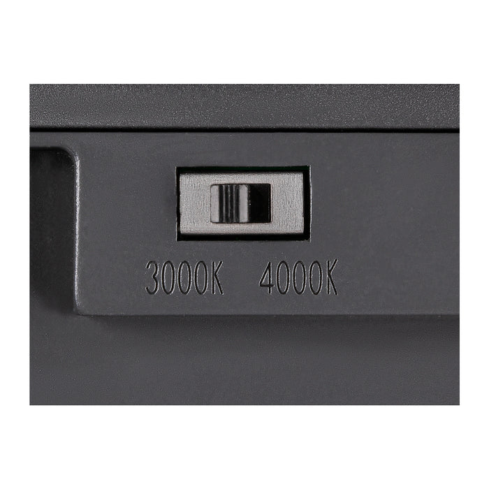 Close-up of a gray fixture with a switch to adjust color temperature between 3000K and 4000K.