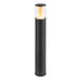 Black metal bollard light with clear glass shade, ground mounted.