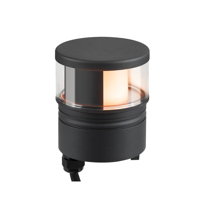 Black cylindrical outdoor path light with clear glass shade.
