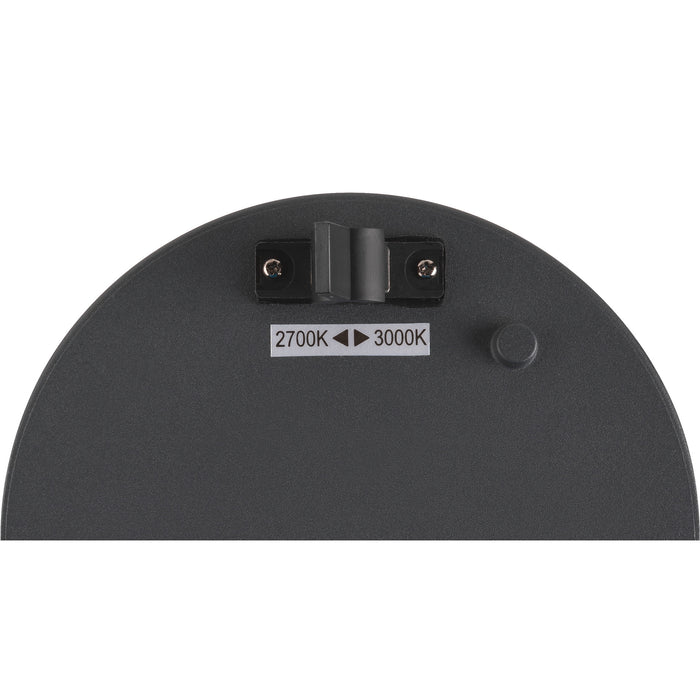 Close-up of a dark gray light base showing a color temperature switch (2700K/3000K) and mounting hardware.