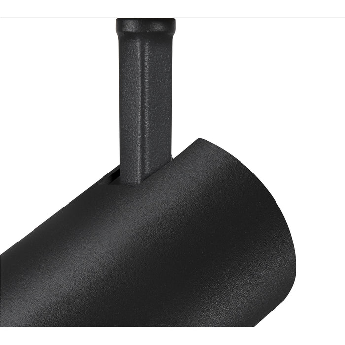 Close-up of a black, textured, track-mounted spotlight fixture.