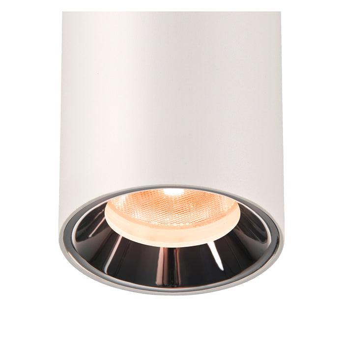 White cylinder surface-mounted light fixture with a textured finish.