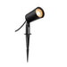Black metal outdoor spotlight with stake mounting.