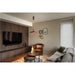 Modern pendant light, copper finish, hanging in a living room.