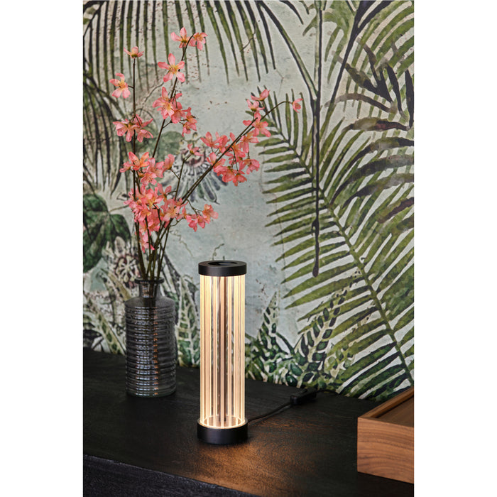 Modern black metal table lamp with vertical acrylic light bars.