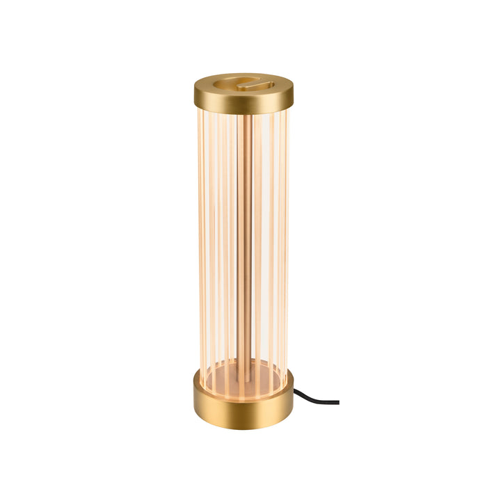 Gold finish table lamp with cylindrical ribbed glass shade and metal base.