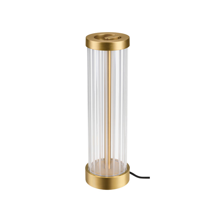 Table lamp with clear ribbed glass shade and gold finish metal base.