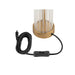 Table lamp with clear glass shade, gold finish base, and black cord with switch.