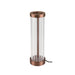Table lamp with clear ribbed glass shade and copper finish metal base.