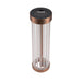 Freestanding cylindrical lamp with clear glass shade and copper-colored metal base and accents.
