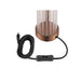 Table lamp with clear glass shade, copper-finish metal base, and black cord with switch.