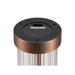 Close-up of a copper-finish metal outdoor light fixture with a 2700K-3000K color temperature switch on the black base.