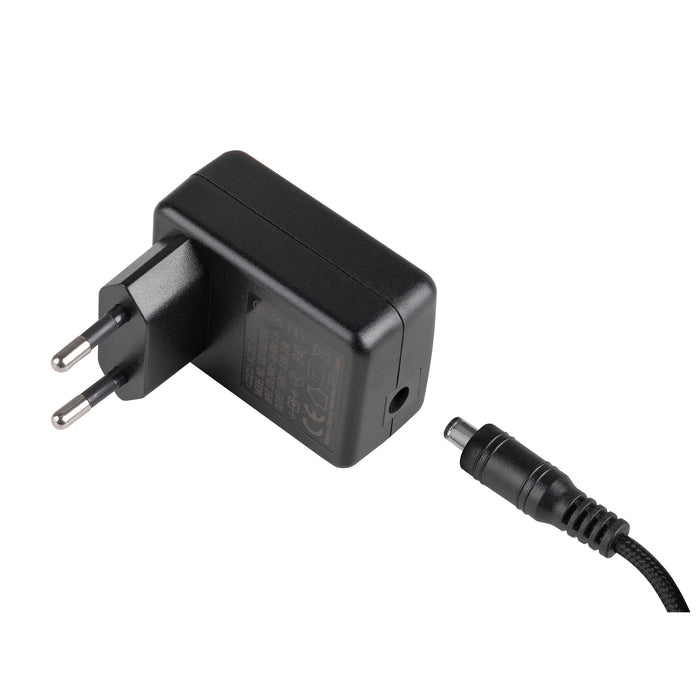 Black plastic AC adapter with EU plug and DC barrel connector.