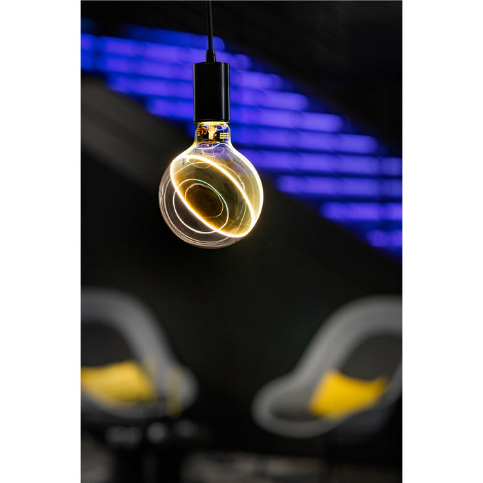 Hanging glass light bulb with black fixture and glowing filament.