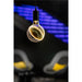 Hanging glass light bulb with black fixture and glowing filament.