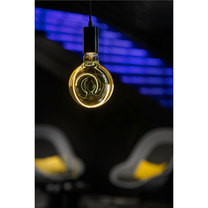 Hanging clear glass light bulb with black fixture and warm yellow filament.