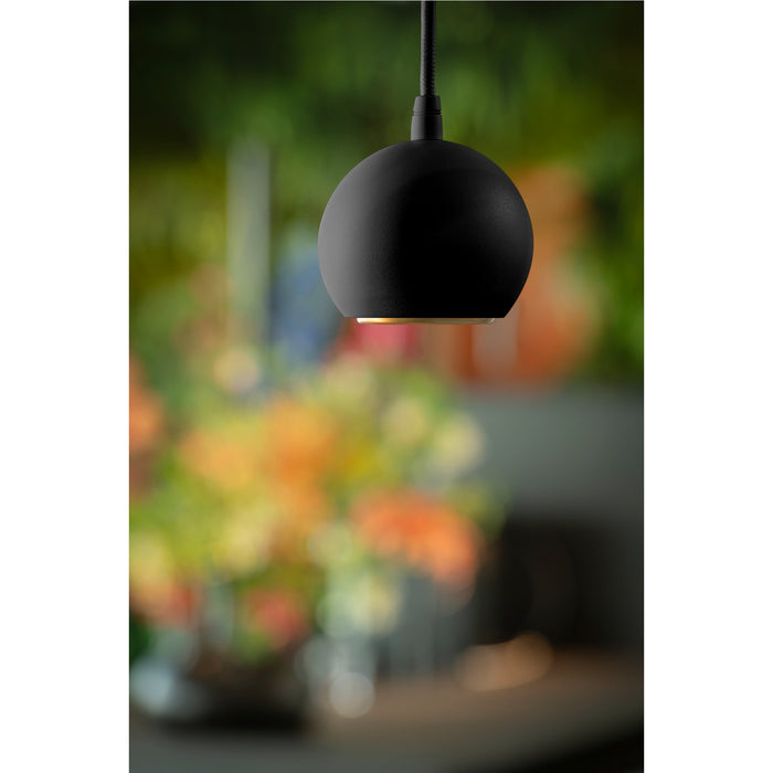 Black metal pendant light fixture with a matte finish.