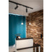 Black track lighting with cylindrical heads and white globe pendant lights.