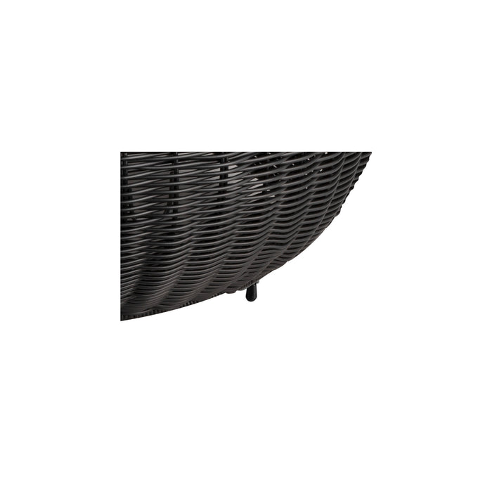 Close-up of a dark brown wicker chair with black legs.