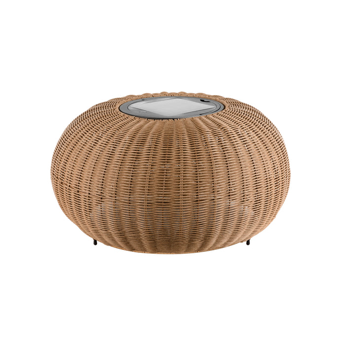 Wicker coffee table, round, tan/brown color, with metal top insert and black legs.