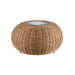 Wicker coffee table, round, tan/brown color, with metal top insert and black legs.