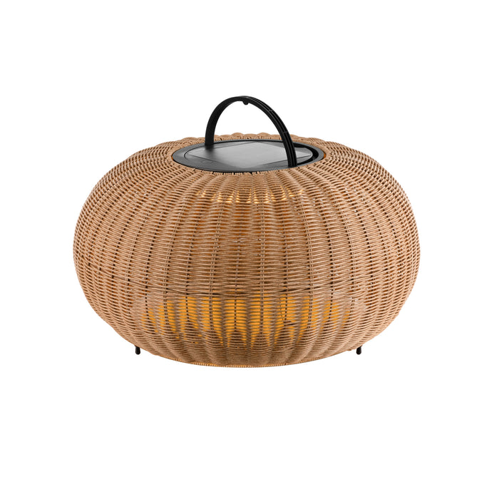 Wicker lantern with black handle, tan finish, and warm light, standing on small legs.