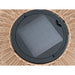 Close-up of a tan wicker basket with a black solar panel insert.