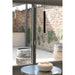 Modern black cylinder pendant light fixture, suspended.