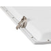 White metal access panel with a latch.