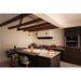 Dark wood kitchen with marble countertops, copper pendant lights, and floral bar stools.