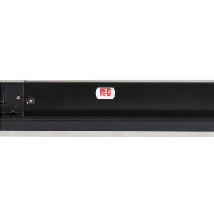 Black metal LED strip light with a red dip switch.