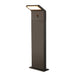 Dark bronze aluminum outdoor bollard light with a textured finish and base mounting.