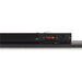 Black track lighting rail, surface mounted.