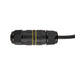 Black plastic cable gland with yellow seal.