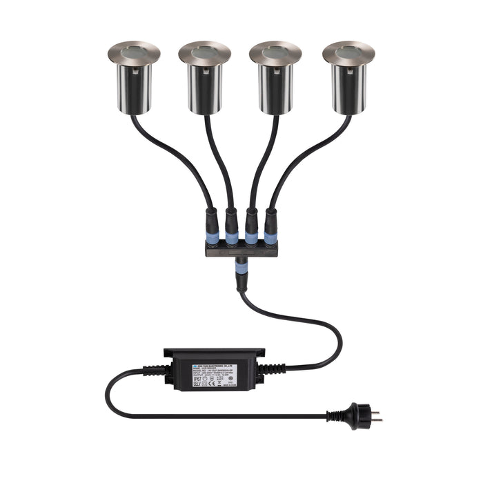 Four recessed stainless steel outdoor lights with black cables and transformer.