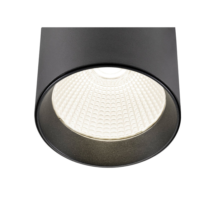 Black aluminum recessed cylinder downlight fixture.